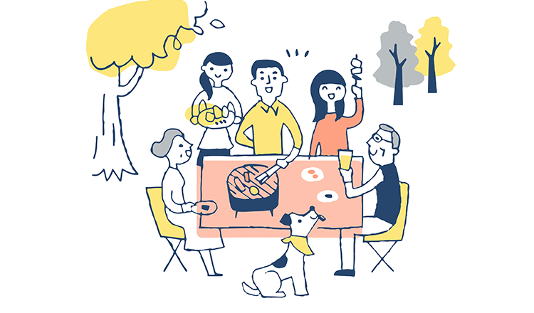 庭で犬と家族が過ごす様子